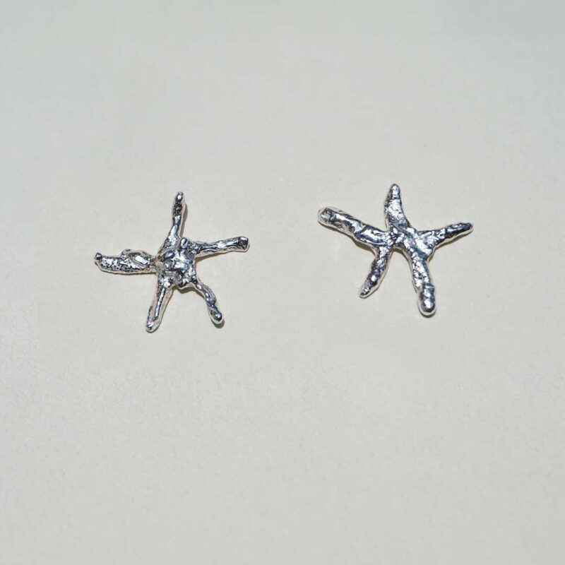 WEIRD STAR EARRINGS